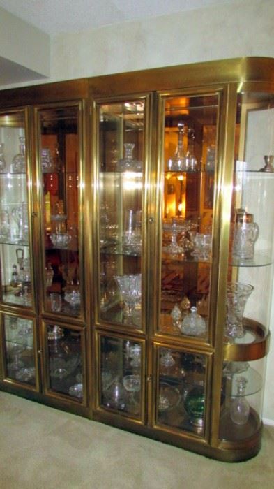 Oversized brass and glass curio ala Milo Baughman (?) with curved sides. It is in two pieces