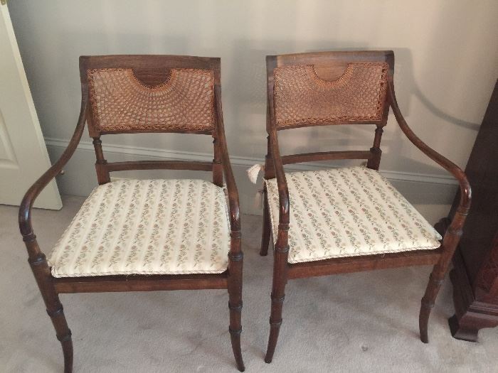 Vintage cane back and bottom arm chairs