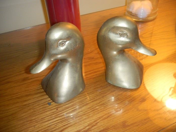 brass duck heads
