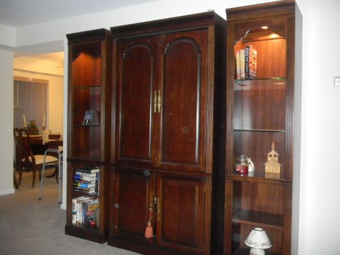 3 piece entertainment center or 2 curio cabinets, can be separated and sold accordingly