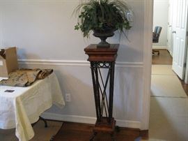 Wooden stand and flower arrangement also 