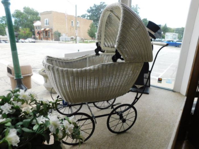 Antique wicker baby stroller