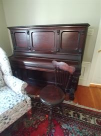 Antique piano and piano stool $450