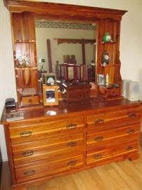 Cedar bedroom suite includes this dresser with mirrored hutch