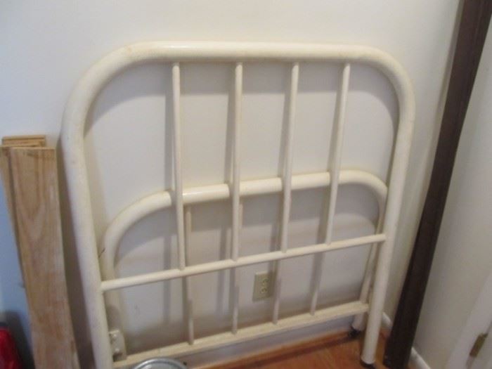 Iron twin bed with rails and slats