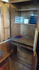 Desk opened with pull out keyboard drawer and drop down work space on left door