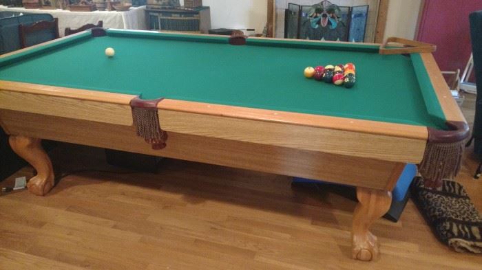 Steepleton pool table with ping pong table top, balls, cue sticks, cue rack-only used once.  The felt is in excellent condition.