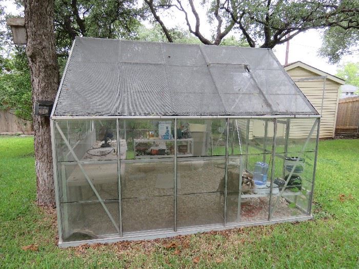 8' x10' Glass Panel Greenhouse. 4' sliding doors. There are two cracked panels. Pre Sale available $650