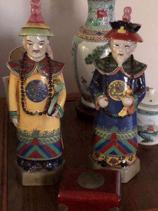 Chinese emperor porcelain statues.
