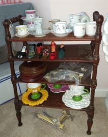Love this little spindle shelf.  And some teacups and saucers