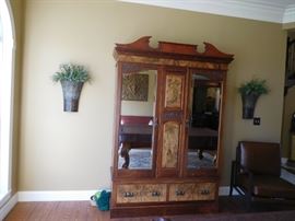antique  armoire  with  beveled  glass  panels