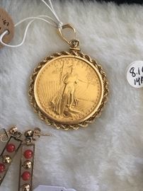 22K Gold coin in a gold mounting.