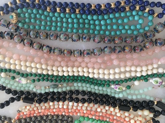 Many precious bead necklaces.
