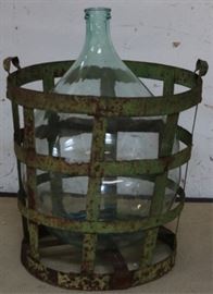 Caged wine bottle