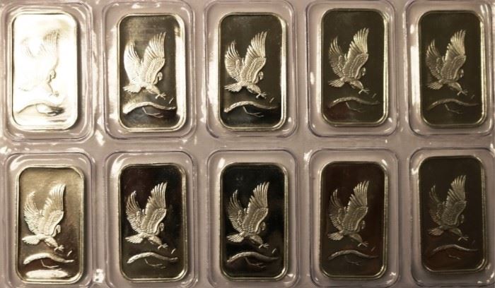 Several silver 1 oz bars
