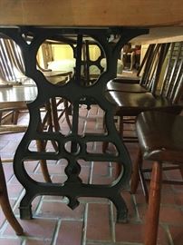 7 ft tile top table with wrought iron legs 