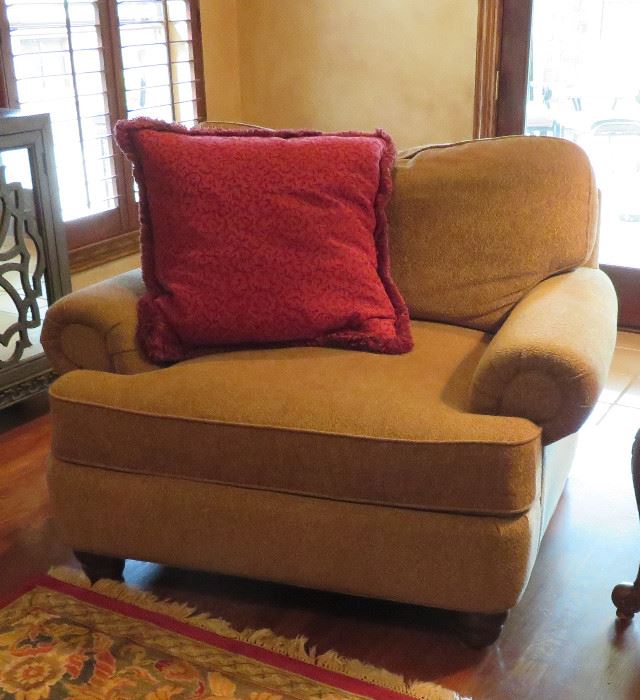 One of two super comfy oversized armchairs