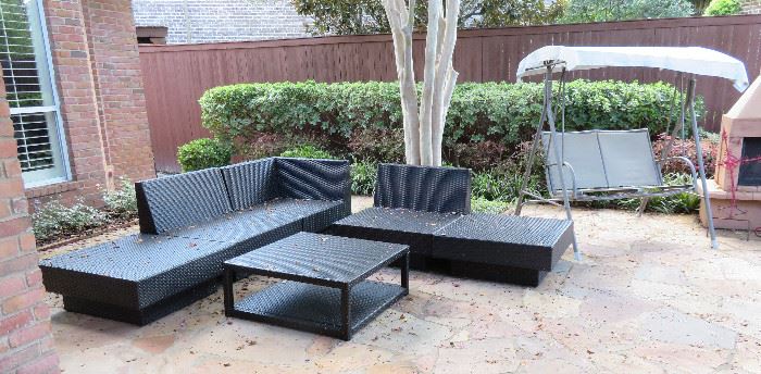 Wicker outdoor furniture - cushions are included.
