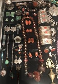 Group of Antique Tibetan turquoise, coral and carnelian jewelry, Eastern European amber, and Central Asian and other ethnographic silver jewelry