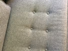 Close up of button pattern on sofa cushion