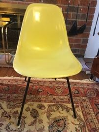 Herman Miller yellow fiberglass-shell chair