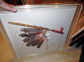 Peace pipe and headdress in an acrylic frame, " end of an era, lost cities replica"
