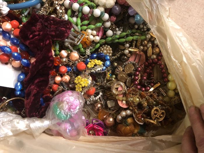 bag full of vintage costume jewelry
