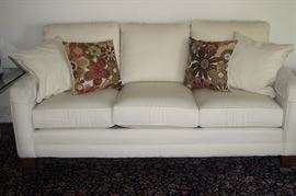 Off white fabric sofa.