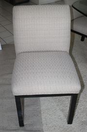One of seven dining chairs.