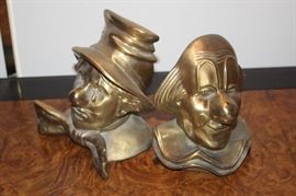 Brass clown bookends.
