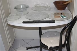 Kitchen table and glass platters.