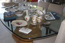 Dining table with, Boehm, Noritake, Royal Copenhagen, Royal Worcester, Lefton, Hammersley, Bavarian tea cups.