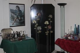 Silver plate, floor lamp, Asian themed bar.