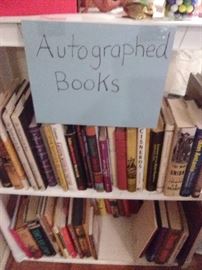 many autographed books!