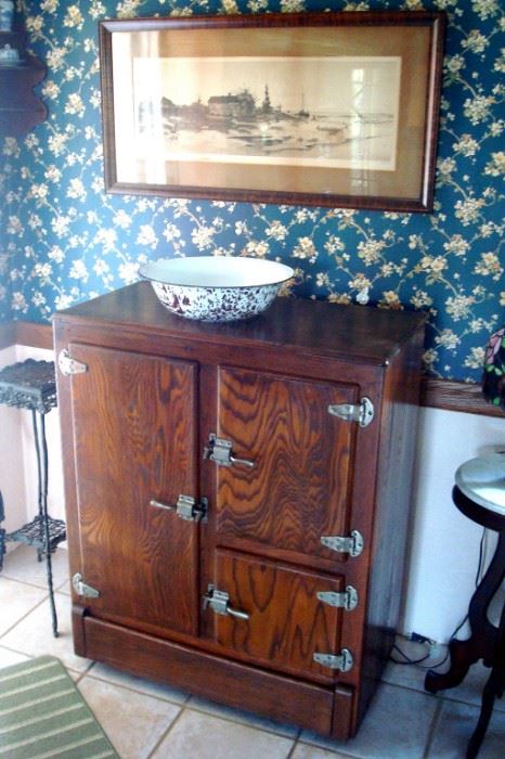 Antique oak ice box, granite ware and limited edition Western print.