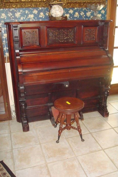 Ornate antique 1890's organ and organ stool.