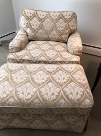 Upholstered arm chair and ottoman by Kravet