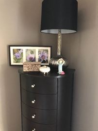 Lingerie chest, porcelain jewelry boxes, framed print and mirrored base lamp with black shade