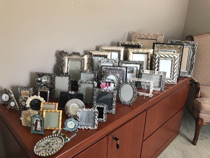 An extensive collection of picture frames - all sizes! Great gifts for the holidays!
