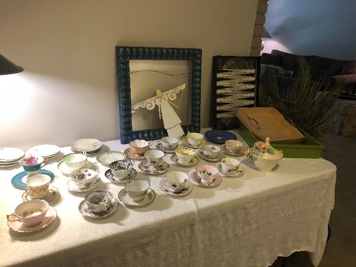 large selection of tea cups and service trays