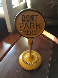 Tropical Paint & Oil "Don't Park Here" cast iron paperweight