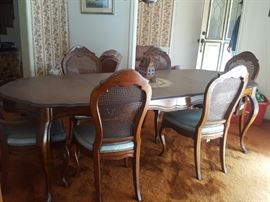 formal dinning set with cane chairs
