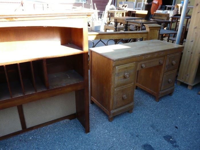 We have a couple old desks.  This one is our favorite.  He needs some love, but he's solid wood and worth the effort.