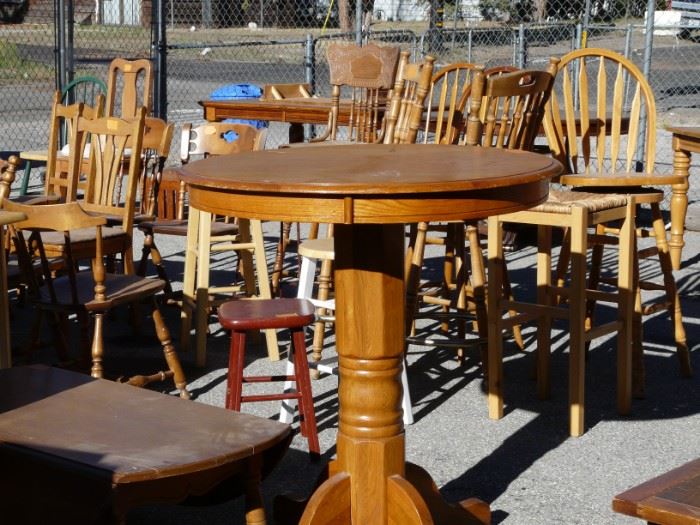 We have quite a few dining tables of all sizes and heights, as well as oh so many chairs.