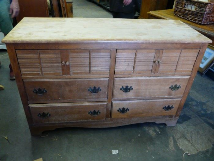 Solid maple 1950's name brand furntiure.  We have a few pieces of it for sale.  It needs some TLC  but you can't beat the quality.