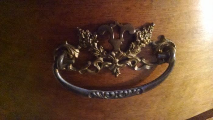 CLOSE-UP....DRESSER HANDLE