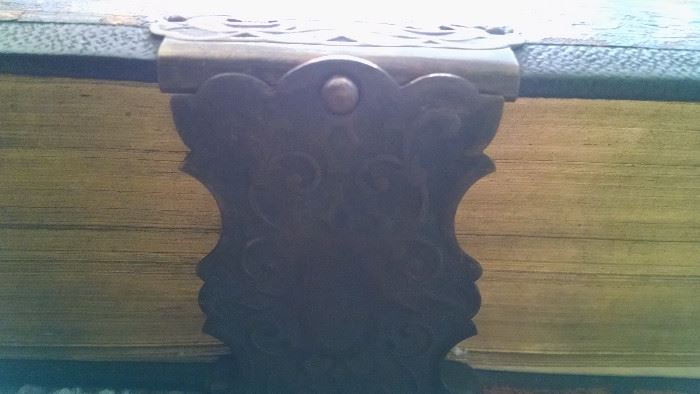 CLOSE-UP...METAL LATCH / BIBLE