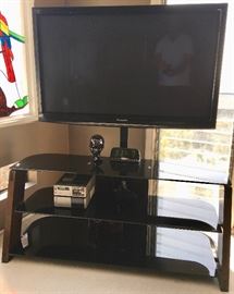 Panasonic Flat Screen TV (on media stand) one of the many TV's available...
