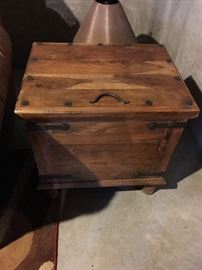 Rustic wooden end table with storage, wrought iron hardware.