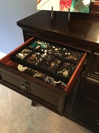 Beautiful dark cherry 9 drawer dresser and mirror. Two end top drawers have built in velvet jewelry holders.